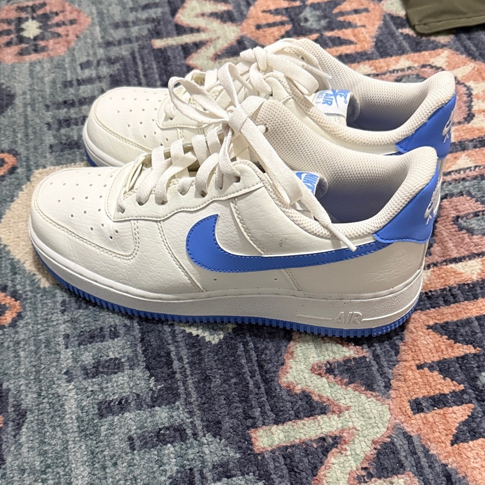 Nike White Low-Top Sneakers with Blue Swoosh